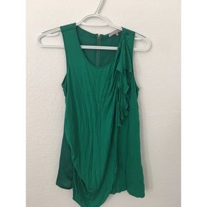 Green ruffled blouse